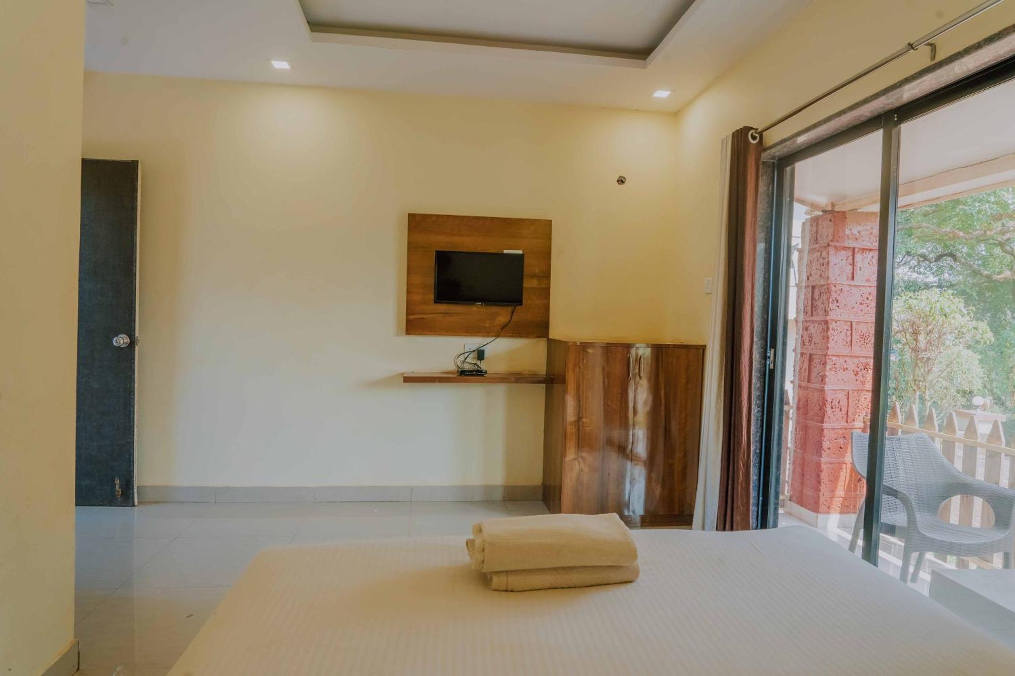Hotel Oakwood Mahābaleshwar Oda fotoğraf
